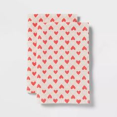 two napkins with hearts printed on them