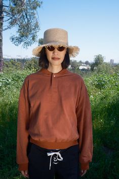 Coastal grandmother meets summer camp counselor in this oversized sweatshirt. Crafted from a soft and cozy medium weight terry cotton with ribbed club collar and pearlized snap detail. Relaxed Fit Top With Corduroy Collar, Cozy Cotton Tops With Ribbed Collar, Cozy Cotton Top With Ribbed Collar, Spring Brown Sweatshirt With Ribbed Cuffs, Brown Sweatshirt With Ribbed Cuffs For Spring, Collared Fall Loungewear Tops, Casual Brown Polo Sweater, Spring Collared Sweatshirt With Relaxed Fit, Collared Loungewear Tops For Fall