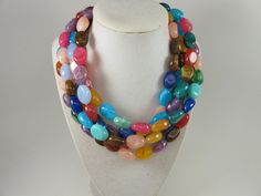 "Rainbow Beaded Necklace, Chunky Colorful Jewelry, Chunky multicolor statement necklace, rainbow jewelry, rainbow fall confetti Simply Gorgeous!! 5 strands for an extra chunky statement look. Beaded necklace in rainbow colors. Silver finishing. This necklace featuring acrylic rainbow beads. 5 strands, light weight. Measurements: 17\" (46 cm) plus 3 1/2\" extender. Each piece of jewelry from my shop comes beautifully packaged in box and ready for gift giving. Thank you for shopping at my shop! 20 Cheap Multicolor Beaded Necklace Statement Piece, Multicolor Beaded Crystal Necklaces, Luxury Multicolor Necklaces For Festive Occasions, Cheap Vibrant Multicolor Necklaces, Affordable Rainbow Beaded Necklace With Large Beads, Luxury Multicolor Necklace For Festivals, Cheap Multicolor Statement Beads, Fall Confetti, Rainbow Beaded Necklace