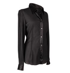 Guaranteed authentic Dolce&Gabbana signature beautifully shaped black button up shirt.Jet black semi sheer silk crepe has a tad of stretch. Trimmed in black satin.Rear center pleat.final saleSIZE 44USA 8TOP MEASURES: LENGTH 28.25"UNDERARM TO UNDERARM 19.25"WAIST 16.5"SLEEVE 25"CONDITION: MINT Designer Black Business Tops, Designer Black Office Shirt, Elegant Fitted Tops With Covered Buttons, Designer Black Tops For Business, Luxury Black Tops For Workwear, Designer Black Semi-formal Top, Luxury Black Blouse For Workwear, Luxury Black Blouse For Work, Designer Black Tops For Semi-formal Occasions