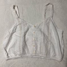 All Orders Ship Next 1-2 Business Days! Conditions: Like New, Clean And Good Condition, No Holes, No Stains, No Fade The Color Is White Never Worn Before Great For Summer Or Spring. Super Cute For Going Out. Smoke Free And Pet Free Home! Casual Cotton Tank Top With Lace Trim, Summer Cotton Crop Top With Lace Trim, Casual Lace Trim Crop Top For Summer, Cotton Crop Top For Daywear, Cropped Lace Trim Tops For Daywear, Cotton Crop Top With Lace Trim For Day Out, Cotton Lace Trim Crop Top For Day Out, Casual V-neck Crop Top With Lace Trim, Cropped Cotton Tops With Lace Trim