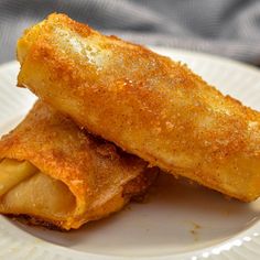 two fried food items on a white plate