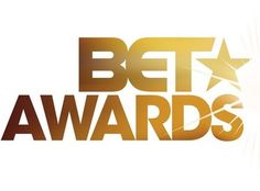 the bet awards logo is shown in gold and silver with a star on top of it