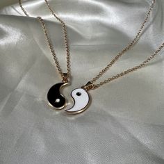 A classic Yin and Yang Friendship/ Couple necklace, keep one for yourself and gift the other to a loved one! Yin and yang (or 陰 and 陽 in traditional Chinese characters) represent duality or the idea that two opposite characteristics can actually exist in harmony and complement each other. In simple terms, yin (Black) is characterized as negative, passive, and feminine, among other things, whereas yang (white) is seen as positive, active, and masculine, among other things. 𖤓 Material: Alloy Size:  Pendant: H: 2.8cm Chain: L44cm Thank you for checking out my shop, for any questions, please feel free to send a message! 🌞 Matching Necklaces Magnetic, Love Necklace Couple, Couple Chains, Ying Yang Necklace, Necklace For Couples, Relationship Necklaces, Friendship Couple, Necklace Couple, Yin Yang Necklace