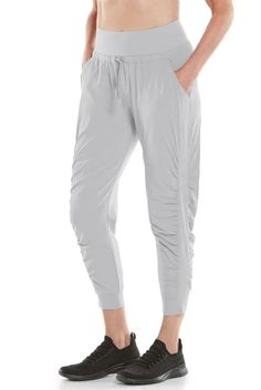 Women's Motio Joggers UPF 50+ - Coolibar® is the World Leader Versatile Spring Activewear For Lounging, Versatile Spring Activewear For Loungewear, Spring Yoga Activewear, Comfortable Casual Activewear For Yoga, Casual Harem Pants With Elastic Waistband For Sports, Lightweight Sports Bottoms With Elastic Waistband, Sports Bottoms With Elastic Waistband, Lightweight Elastic Waistband Sports Bottoms, Lightweight Athleisure Bottoms With Pockets