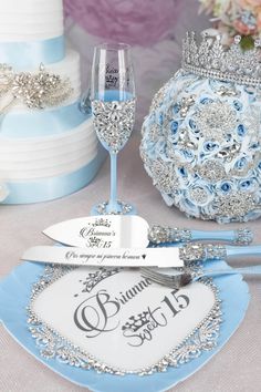 the table is decorated with blue and silver decorations