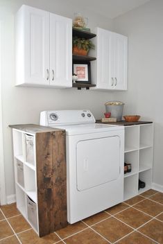 a white washer and dryer sitting in a room