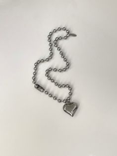 "The Heart of Steel Necklace 🤍 Featuring a silver puffed heart and 17.5\" 6mm ball chain~ all composed of hypoallergenic stainless steel that won't tarnish or fade! Handmade with love" Silver Heart Jewelry With Ball Chain, Cheap Heart-shaped Silver Chain Jewelry, Heart-shaped Stainless Steel Chain Jewelry, Heart-shaped Stainless Steel Jewelry With Silver Chain, Heart-shaped Ball Chain Necklace Gift, Silver Heart-shaped Ball Chain Jewelry, Steel Necklace, Punk Jewelry, Puffed Heart