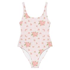 Our La Vie En Rose print, feminine and floral was designed to allow you to live your life in a beautiful pink rose garden inspired by the the Rodin Museum in Paris, France. This one-piece swimsuit for all figures will bring out your best features. Enjoy the smooth fabric and the flattering design, and show it off by the sea, pool or even worn as a body suit for elevated style !• 82% Polyester, 18% Spandex• Chlorine-resistant fabric• Cheeky fit with a scoop neckline and a low scoop back• Zig-zag Feminine Fitted Floral Print Swimwear, Fitted Floral Print Feminine Swimwear, Feminine Floral Print Swimwear, Fitted Pink Floral Print Bodysuit, Feminine Pink Floral Print Swimwear, Feminine Printed Swimwear For Poolside, Feminine Floral Print Swimwear For Poolside, Feminine Floral Print Swimwear For Swimming, Feminine Printed Swimwear For Spring