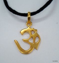 ethnic sterling silver gold vermeil gold gilded om sign amulet pendant necklace from rajasthan india. great handmade design, good for jewelry collection. weight - 6 gramsheight max - 4 cm(1.57")width max.- 2.2 cm(0.86")Material - sterling silver gold plate on top. Spiritual Gold Temple Necklace In Brass, Gold Brass Temple Necklace With Spiritual Style, Spiritual Gold Brass Temple Necklace, Spiritual 22k Gold Necklaces For Festivals, Spiritual 22k Gold Jewelry For Festivals, Spiritual Gold Temple Necklace For Festivals, Spiritual Gold Jewelry For Diwali, Gold Spiritual Jewelry For Puja, Gold Jewelry Pendant For Diwali