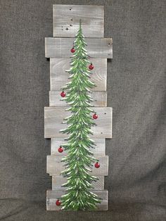 This unique piece is 36" x apprx. 12" This Christmas tree with red bulbs on a gray stained background that is white washed, is perfect for a personalized rustic touch to your Christmas decorating. Perfect for that skinny wall space or just lean it against the wall.  **All of my creations are made of reclaimed boards. T Christmas Pallet Painting, Christmas Pallet Knife Art, Pallet Knife Christmas Painting, How To Paint A Pallet Christmas Tree, Painted Pallet Art, Snow Ans Tree Painting On Wood, Christmas Tree Sign, Painting On Pallet Wood, Farmhouse Winter Decor