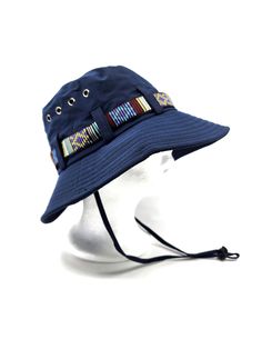 Colors: Navy Blue Wide Brim Bucket Hat For Festivals, Adjustable Navy Hat For Outdoor, Navy Adjustable Hat For Travel, Navy Brimmed Hat For Outdoor, Blue Visor Bucket Hat For Outdoor, Blue Bucket Hat With Visor For Outdoor, Navy Bucket Hats For Outdoor, Navy Bucket Hat For Outdoor, Adjustable Blue Bucket Hat For Outdoor