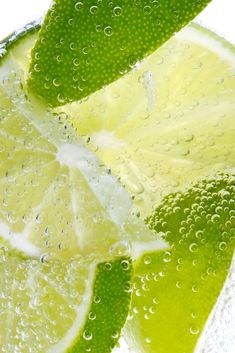 lime slices with water droplets on them