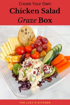 a plastic container filled with chicken salad and crackers on top of it, next to some veggies