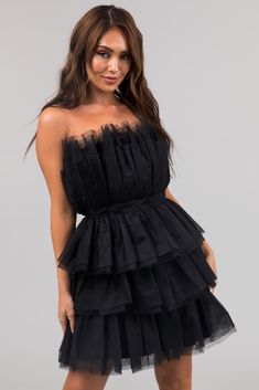 S M L Length: 27" 27" 27" Bust: 30" 32" 34" Waist: 28" 30" 32" ﻿Fits true to size, measured on a standard size 4 Non-stretchy tulle Waistband detail Hidden side zipper  Imported Lined Self: 100% Polyester Lining: 95% Polyester, 5% Spandex   Note: Hand wash with cold water separately, no bleach, line dry. Model is wea Fitted Tulle Dress For Prom, Stretch Ruffle Dresses For Prom, Stretch Ruffled Dresses For Prom, Stretch Ruffles Dresses For Prom, Fitted Sheer Mini Dress For Prom, Sheer Stretch Prom Dresses, Fitted Strapless Organza Dress With Ruffles, Stretch Strapless Nylon Dress, Fitted Black Dress With Tulle Skirt