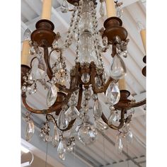 a chandelier hanging from the ceiling in a room