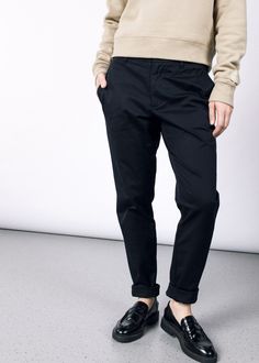 The only pants you need in your wardrobe, featuring welted pockets and a convertible hem for maximum versatility.PRODUCT DETAILS:/ Classic chino pant fit/ Made to last with beautifully crafted details/ Deep, functional pockets/ 10.5" rise and 28" inseam/ 98% cotton, 2% spandex/ Machine wash cold, tumble dry lowSIZE & FIT:/ Sam is wearing size 2/ Diona is wearing size 18 Casual Workwear Pants With Rolled Hem, Casual Pants With Rolled Hem For Workwear, Casual Stretch Bottoms With Button Cuffs, Classic Workwear Bottoms With Rolled Hem, Classic Rolled Hem Bottoms For Workwear, Versatile Relaxed Fit Tapered Leg Dress Pants, Classic Bottoms With Rolled Hem For Workwear, Versatile Business Casual Bottoms With Straight Hem, Versatile Tapered Leg Dress Pants In Relaxed Fit