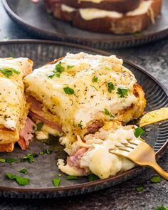 two plates with sandwiches on them, one has cheese and the other has meat in it