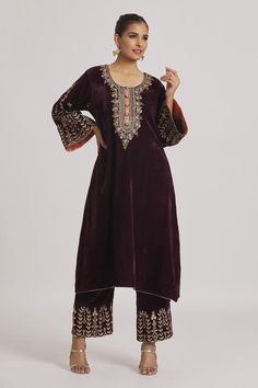 Wine velvet kurta with floral hand, machine embroidery. Paired with pyjama.
Components: 2
Pattern: Embroidered
Type Of Work: Floral
Neckline: Round
Sleeve Type: Flared
Fabric: Velvet
Color: Wine
Other Details: 
Floral embroidery
Model height: 5ft 11inches, wearing size M
Occasion: Wedding - Aza Fashions Festive Velvet Straight Kurta, Unstitched Velvet Traditional Kurta, Velvet Straight Kurta With Zari Work, Traditional Velvet Salwar Kameez With Straight Kurta, Semi-stitched Velvet Kurta For Eid, Velvet Straight Kurta For Festivals, Straight Velvet Kurta For Festivals, Velvet Straight Kurta For Diwali, Velvet Semi-stitched Kurta For Eid