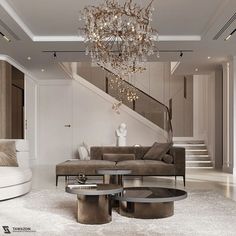 a living room with a couch, coffee table and chandelier hanging from the ceiling