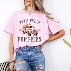 WELCOME TO TEEARTTGifts  Farm Fresh Pumpkins Shirt, Fall Women T-shirt, Thanksgiving T-shirt, Fall Pumpkin, Fall Tee, Pumpkin Patch, Thanksgiving & Halloween If you are looking for soft, comfy, first-rate  shirts, you're in the right place! Here at TEEARTTGifts we love what we do and strive to make your shopping experience just right for you. If you have any questions, concerns, or comments about our products, feel free to shoot us a message anytime. Even on weekends and holidays, we'll try our Pink Graphic Print T-shirt For Fall, Trendy Halloween Short Sleeve T-shirt, Pink Slogan Top For Fall, Funny Cotton Tops For Fall, Halloween Pink T-shirt With Screen Print, Pink Halloween T-shirt With Screen Print, Funny Text Print Tops For Fall, Fun Fall T-shirt With Funny Print, Halloween Cotton T-shirt With Text Print