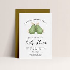 a baby shower card with two pears on it