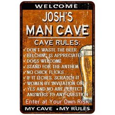 a sign that says,'welcome to the man cave'with a glass of beer