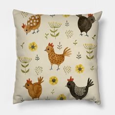 a pillow with chickens and sunflowers on it