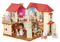 a doll house with lots of furniture and accessories