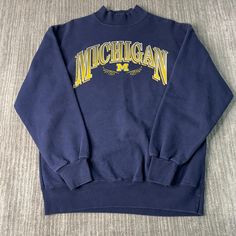 Vintage 90s Michigan Wolverines University College Sportswear Athletic Made in USA Streetwear Navy Graphic Crewneck Large Mens Condition:  Excellent Used Condition  = No Flaws Measurements: Please see photos above for all measurements IF YOU BUY TWO OR MORE ITEMS USE THE CODE BUNDLE @ CHECK TO SAVE 20% WE SHIP WITHIN 24 HOURS AFTER PURCHASE! Please be aware that we do not offer free returns!! The Buyer is responsible for the cost of the return label.  Follow us on TikTok & Instagram @findsnostal 90s Style Sweatshirt For Fall Sports Events, Vintage Michigan, University College, Michigan Wolverines, Colleges And Universities, Graphic Crewneck, Vintage 90s, Michigan, Made In Usa