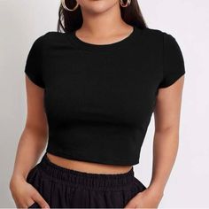 Brand New In Original Packaging Color: Black Size: Medium (6) Rib-Knit 67% Polyester, 30% Viscose, 3% Elastane Casual Non-stretch Solid Color Crop Top, Basic Plain Crop Top, Non-stretch Ribbed Black Tops, Black Non-stretch Ribbed Top, Black Solid Color Crop Top, Basic Black Solid Color Top, Black Short Sleeve Crop Top For Fall, Trendy Black Crop Top, Black Ribbed Crew Neck Crop Top