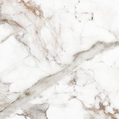 white marble textured with brown vein lines