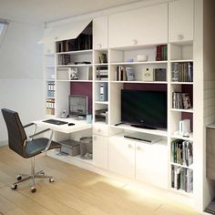 a room with a desk, bookshelf and computer on the wall in it