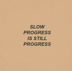 the words slow progress is still progress written in black on a beige background with an orange border