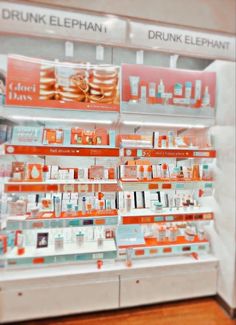 an orange and white display case in a store