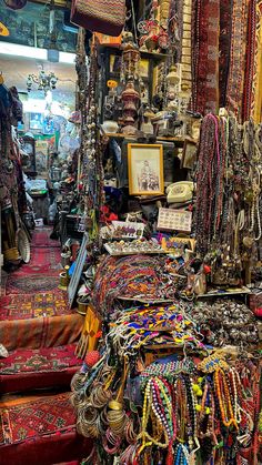 an open market with lots of different colored necklaces