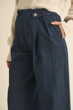 Discover effortless style with our new high-waist denim wide-leg pants. Featuring front pleats and button detailing, these pants offer a flattering silhouette and timeless appeal. Perfect for elevating your everyday look with a touch of classic sophistication. Button/zip front closure Pleated waist Straight legs Minimal stretch Size Length Waist Hip Inseam Rise Small 41" 27" 42" 30" 12.5" Medium 42" 29" 44" 31" 13" Large 43" 31" 46" 32" 13.5" Pantalon Large, White Maxi, Denim Trousers, Romper Pants, Wide Leg Denim, High Waisted Denim, Denim Shop, Everyday Look, Effortless Style