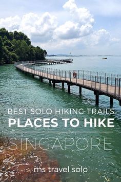 a wooden bridge over water with the words best solo hiking trails places to hike singapore