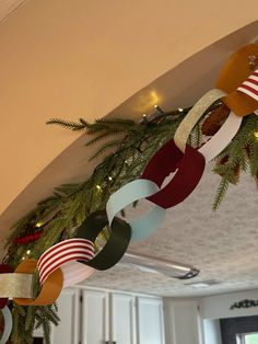 a christmas garland hanging from the ceiling