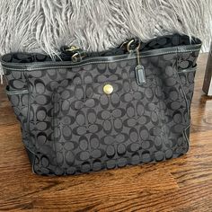 Coach Signature Diaper Bag. Can Be Used For A Regular Bag/Work Bag. Many Pockets And Large Size. Coach Black Bag With Detachable Handle, Coach Black Shoulder Bag For Errands, Coach Black Pouch Bag, Coach Black Travel Bag, Coach Black Shoulder Bag For Travel, Black Coach Travel Bag, Black Coach Bag For Travel, Work Bag, Large Size