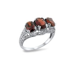 Vintage Estate Three Stone Natural Garnet Filigree Ring. Natural Garnet Accent Stones. 925 Solid Sterling Silver. The Top Of The Ring Measures 10 mm Wide, 3/8 Inches At The Widest Point. Stamped 925. Excellent Condition/Like New. Classic Polished Ruby Ring, Classic Engraved Filigree Ring, Classic Hallmarked Sterling Silver Ruby Ring, Classic Ruby Ring In Sterling Silver, Classic Sterling Silver Ruby Ring Stamped 925, Elegant Ruby Ring Stamped 925, Elegant Silver Ruby Three Stone Ring, Elegant Silver Ruby Ring With Three Stones, Classic Sterling Silver Filigree Ring With Gemstone