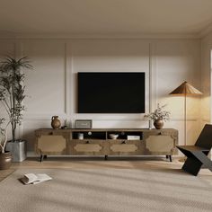 a living room with a large television on the wall