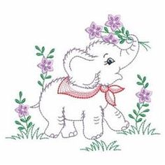 an elephant with flowers on its head is standing in the grass and has it's trunk