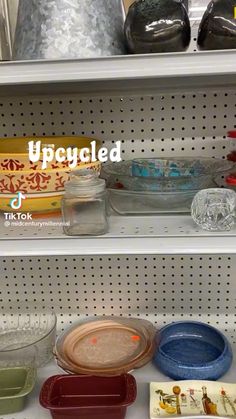 the shelves are filled with different types of dishes