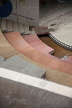 the skateboarder is doing tricks on the ramp