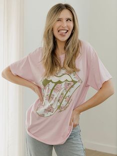 Our 100% Preshrunk Cotton thrifted tees are meaningfully distressed and officially licensed. Each piece is one of a kind, and colors/distressing may vary from shirt to shirt. Pairs well with vintage denim and your favorite kicks.The details:- 100% Preshrunk Cotton- Unisex Fit- Meaningfully Distressed, each piece unique- Colors + Distressing may vary- Officially Licensed Vintage Summer T-shirt For Loungewear, Spring Distressed Graphic Tee T-shirt, Acid Wash Band Merch T-shirt In Relaxed Fit, Pink Graphic Print T-shirt For Loungewear, Oversized Band Merch T-shirt For Spring, Summer Acid Wash Top With Front Print, Trendy Tri-blend Soft-washed Tops, Acid Wash Tops With Front Print For Summer, Acid Wash Top With Front Print For Summer