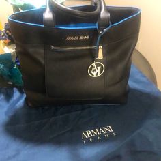 Black Armani Jeans Tote Bag Royal Blue Lining. Gently Used. Dust Bag Included. Jeans Tote Bag, Silver Handbag, Jean Purse, Jeans Bags, Grey Tote, Blue Handbags, Jeans Bag, Armani Jeans, Jeans Women