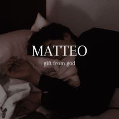 a man laying in bed with the words mateo on his chest and hand over his face