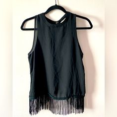 All Orders Ship 1-3 Business Days Ya Las Angeles Black Fringed Top With Open Back. Size Large. New With Tags. Closes With One Button At The Back Of The Neck. Smoke Free Home! Black Fringe Top For Night Out, Sleeveless Black Top With Fringe, Black Fringe Top, Top With Open Back, Wardrobe Pieces, Fringe Top, Black Fringe, Open Back, Angeles