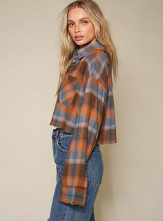 Get ready to look cute and stylish in our Nancy Burnt Orange Plaid Shirt! This top features a classic plaid pattern in a warm burnt orange color. Perfect for adding a pop of color to any outfit, you'll love the versatility and comfort of this shirt. Plus, the soft and breathable material will keep you feeling cozy all day long. DETAILS Burnt Orange Plaid Cropped Raw Hem Button Down Shirt Mimosa is a clothing brand focusing on modern, chic, and sophisticated styles that are timeless & trendy usin Burnt Orange Color, Orange Plaid, Swimwear Dress, Swimwear Sale, Modern Chic, Skirted Swimwear, Matching Dresses, Mimosa, Sophisticated Style